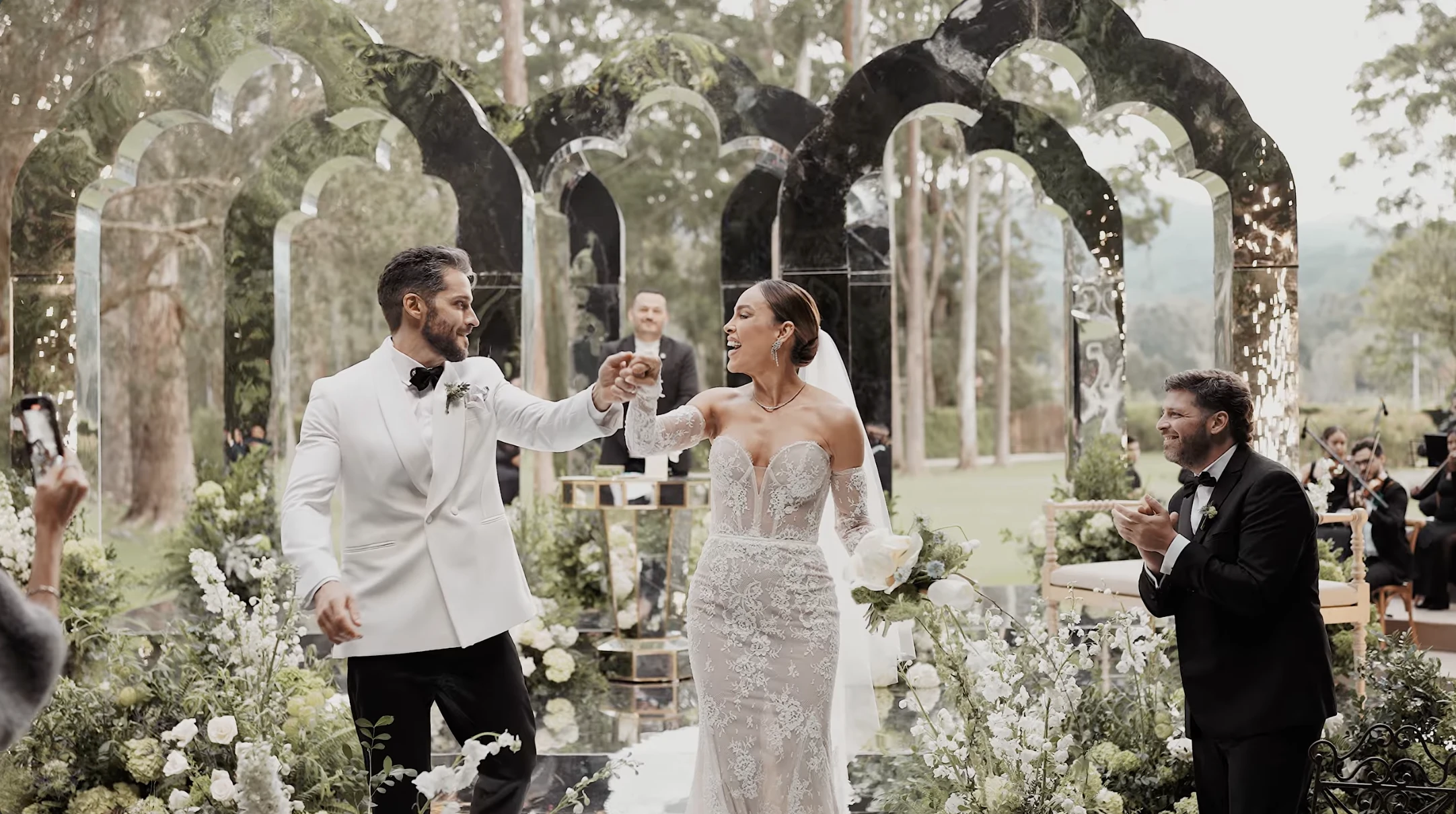 Bride and groom on the beach at sunset — golden-hour light for a Miami elopement wedding